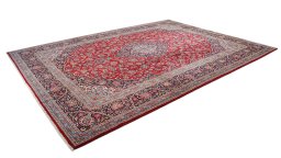 Corner detail of New Kashan rug showing border pattern and Wool pile