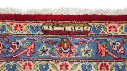 Close-up detail of New Kashan rug from Iran / Persia showing Wool weave