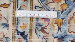Close-up detail of New Kashan rug from Iran / Persia showing Wool weave