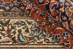 Corner detail of 1940s Kashan rug showing border pattern and Wool pile