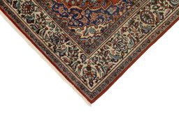 Backside of handmade 1940s Kashan rug showing knot structure and weave density