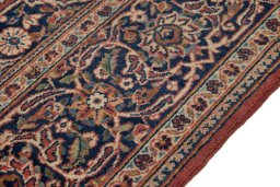 Close-up detail of New Kashan rug from Iran / Persia showing Wool weave