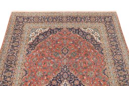Surface texture of 1990s Kashan rug with natural Cork and intricate pattern