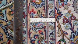 Corner detail of 1980s Kashan rug showing border pattern and Wool pile