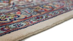 Close-up detail of 1980s Kashan rug from Iran / Persia showing Wool weave