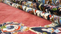 Full view of 1980s Kashan rug from Iran / Persia, 470 × 352 cm in Red tones