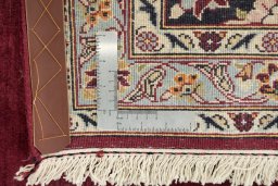 Close-up detail of 1980s Kashan rug from Iran / Persia showing Wool weave