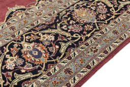 Close-up detail of 1980s Kashan rug from Iran / Persia showing Wool weave