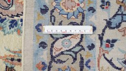 Corner detail of 1970s Kashan rug showing border pattern and Wool pile