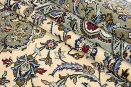 Corner detail of 1990s Kashan rug showing border pattern and Wool pile