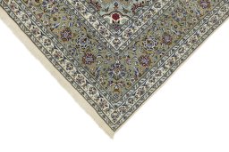 Backside of handmade 1990s Kashan rug showing knot structure and weave density