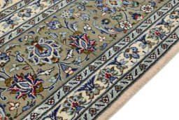 Close-up detail of 1990s Kashan rug from Iran / Persia showing Wool weave