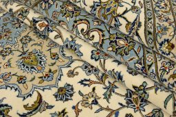 Corner detail of 1990s Kashan rug showing border pattern and Wool pile