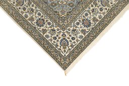 Backside of handmade 1990s Kashan rug showing knot structure and weave density