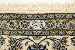 Close-up detail of 1990s Kashan rug from Iran / Persia showing Wool weave
