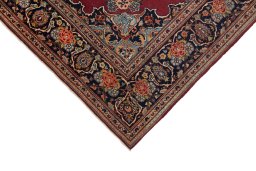 Backside of handmade 1940s Kashan rug showing knot structure and weave density