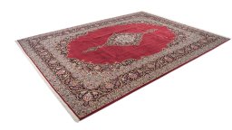 Corner detail of 1990s Kashan rug showing border pattern and Wool pile