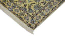 Backside of handmade 1990s Kashan rug showing knot structure and weave density