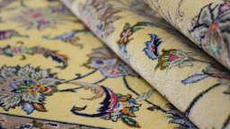 Close-up detail of 1990s Kashan rug from Iran / Persia showing Silk weave
