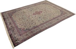 Corner detail of 1900s Kashan rug showing border pattern and Silk pile