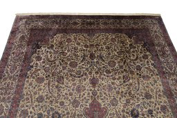 Backside of handmade 1900s Kashan rug showing knot structure and weave density