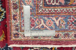 Full view of 1950s Kashan rug from Iran / Persia, 378 × 270 cm in Red tones