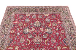 Surface texture of 1950s Kashan rug with natural Wool and intricate pattern