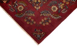 Backside of handmade 1950s Kashan rug showing knot structure and weave density