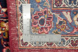 Close-up detail of 1950s Kashan rug from Iran / Persia showing Wool weave