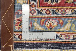 Close-up detail of New Kashan rug from Iran / Persia showing Wool weave