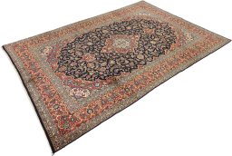 Close-up detail of New Kashan rug from Iran / Persia showing Wool weave