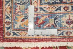 Full view of 1950s Kashan rug from Iran / Persia, 422 × 305 cm in Red tones