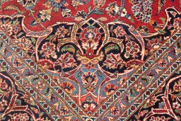 Full view of 1950s Kashan rug from Iran / Persia, 363 × 229 cm in Dark red tones