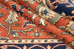 Close-up detail of 1980s Kashan rug from Iran / Persia showing Wool weave