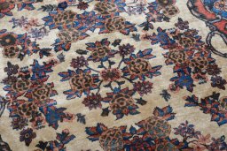 Surface texture of 1950s Kashan rug with natural Wool and intricate pattern