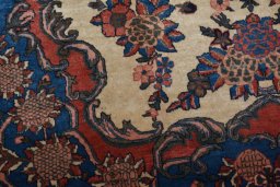 Backside of handmade 1950s Kashan rug showing knot structure and weave density