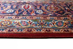 Surface texture of 2000s Kashan rug with natural Wool and intricate pattern