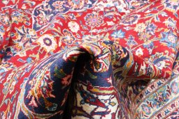 Central medallion detail of 2000s Kashan rug from Iran / Persia