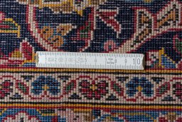 Central medallion detail of 2000s Kashan rug from Iran / Persia