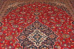 Close-up detail of 2000s Kashan rug from Iran / Persia showing Wool weave