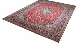 Surface texture of 2000s Kashan rug with natural Wool and intricate pattern