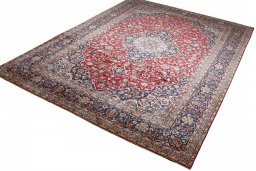 Close-up detail of 2000s Kashan rug from Iran / Persia showing Wool weave