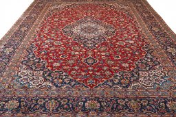 Surface texture of 2000s Kashan rug with natural Wool and intricate pattern
