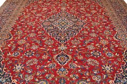 Close-up detail of 2000s Kashan rug from Iran / Persia showing Wool weave