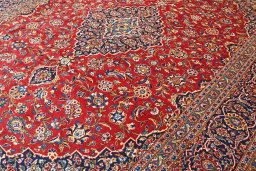 Close-up detail of 2000s Kashan rug from Iran / Persia showing Wool weave