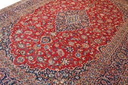 Close-up detail of 2000s Kashan rug from Iran / Persia showing Wool weave
