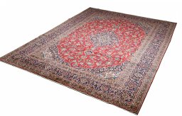 Surface texture of 2000s Kashan rug with natural Wool and intricate pattern