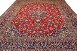 Central medallion detail of 2000s Kashan rug from Iran / Persia