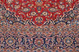 Full view of 2000s Kashan rug from Iran / Persia, 400 × 298 cm in Red tones