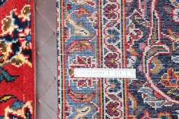 Central medallion detail of 2000s Kashan rug from Iran / Persia